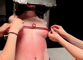 Bdsm babe with head in steel box spaked