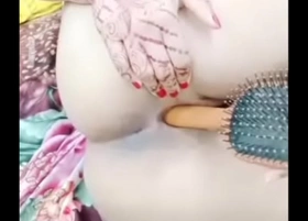 Pakistani wife inserting hair brush in her little tight ass hole