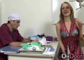 Gyno doctor slips a finger and speculum in her vulva
