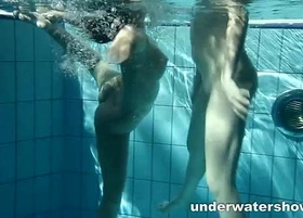 Zuzanna and lucie carrying-on underwater
