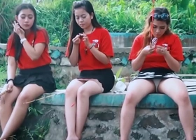 Upskirt peek caught of slut black lie with friends